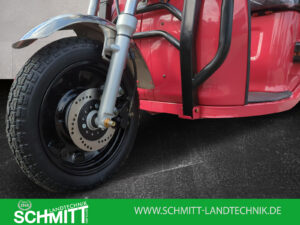 Nahaufnahme der Vorderradgabel beim roten Modell mit sichtbarer Scheibenbremse