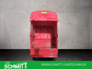 Rückansicht des roten Modells mit aufgerollter Plane und Blick auf die Ladefläche